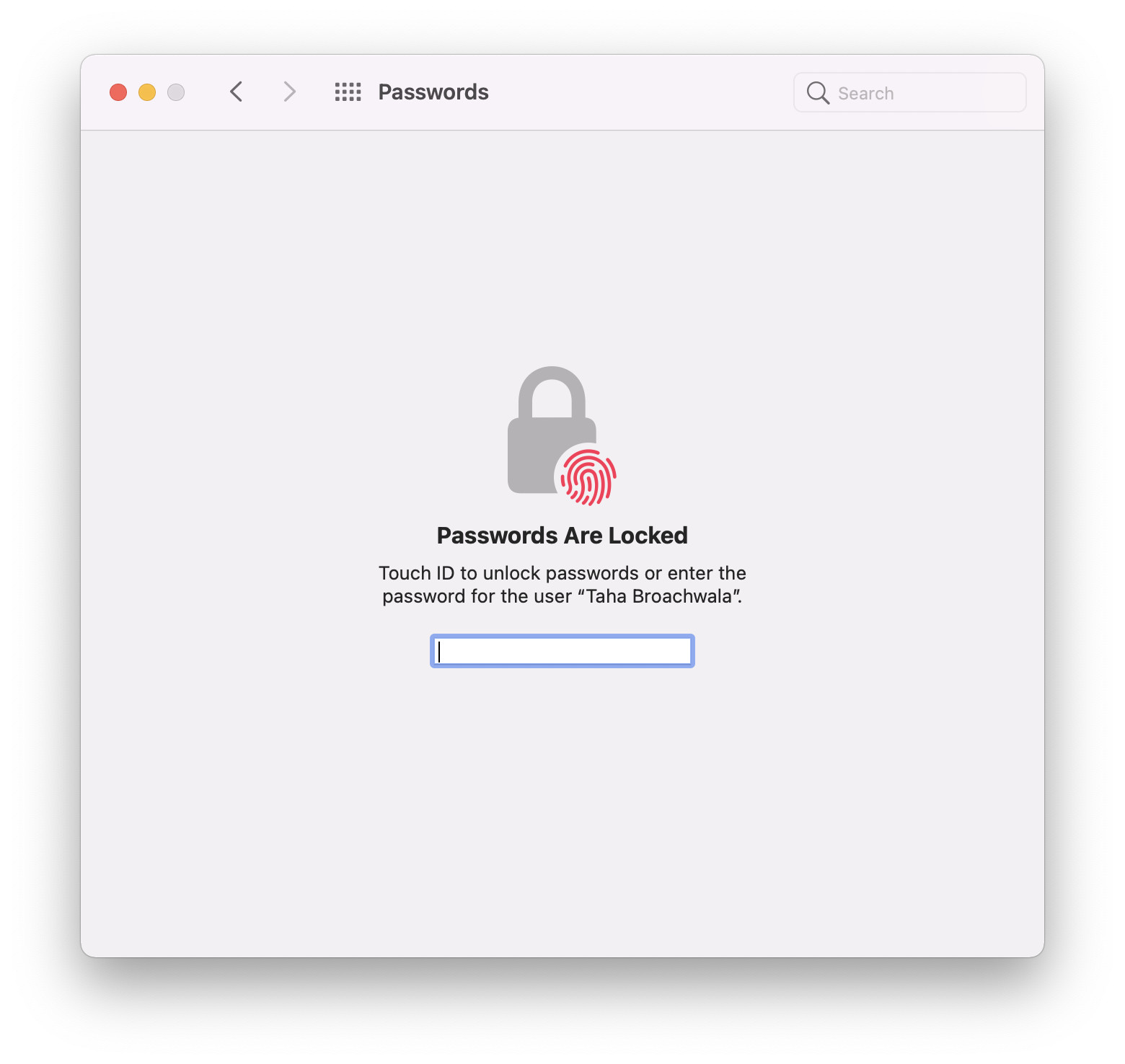 macOS 12 Passwords section authentication within System Preferences.